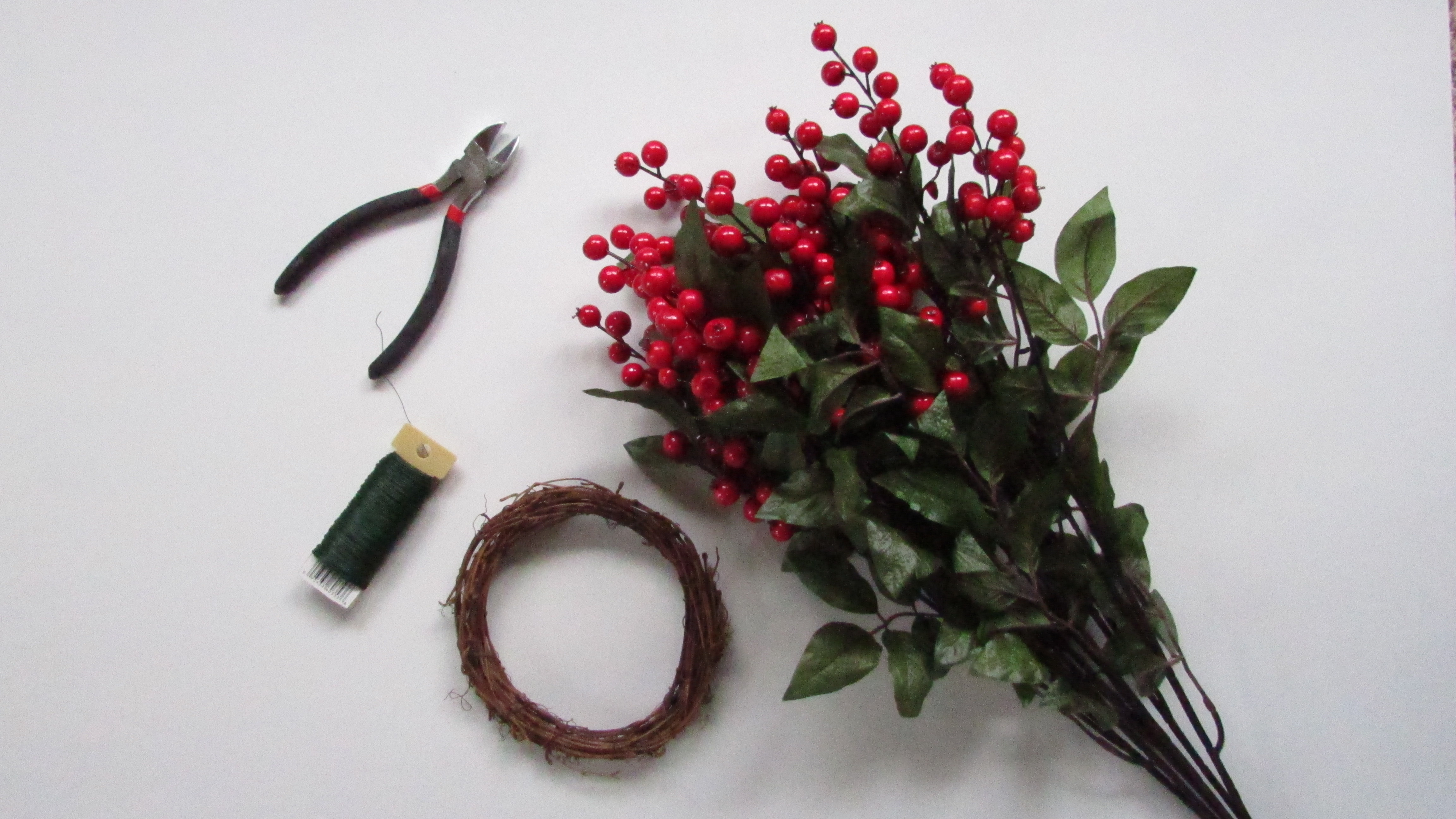 wire cutters, floral wire, grapevine wreath, red and green floral