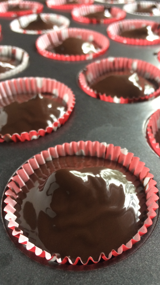 close up of peanut butter cups in muffin tin