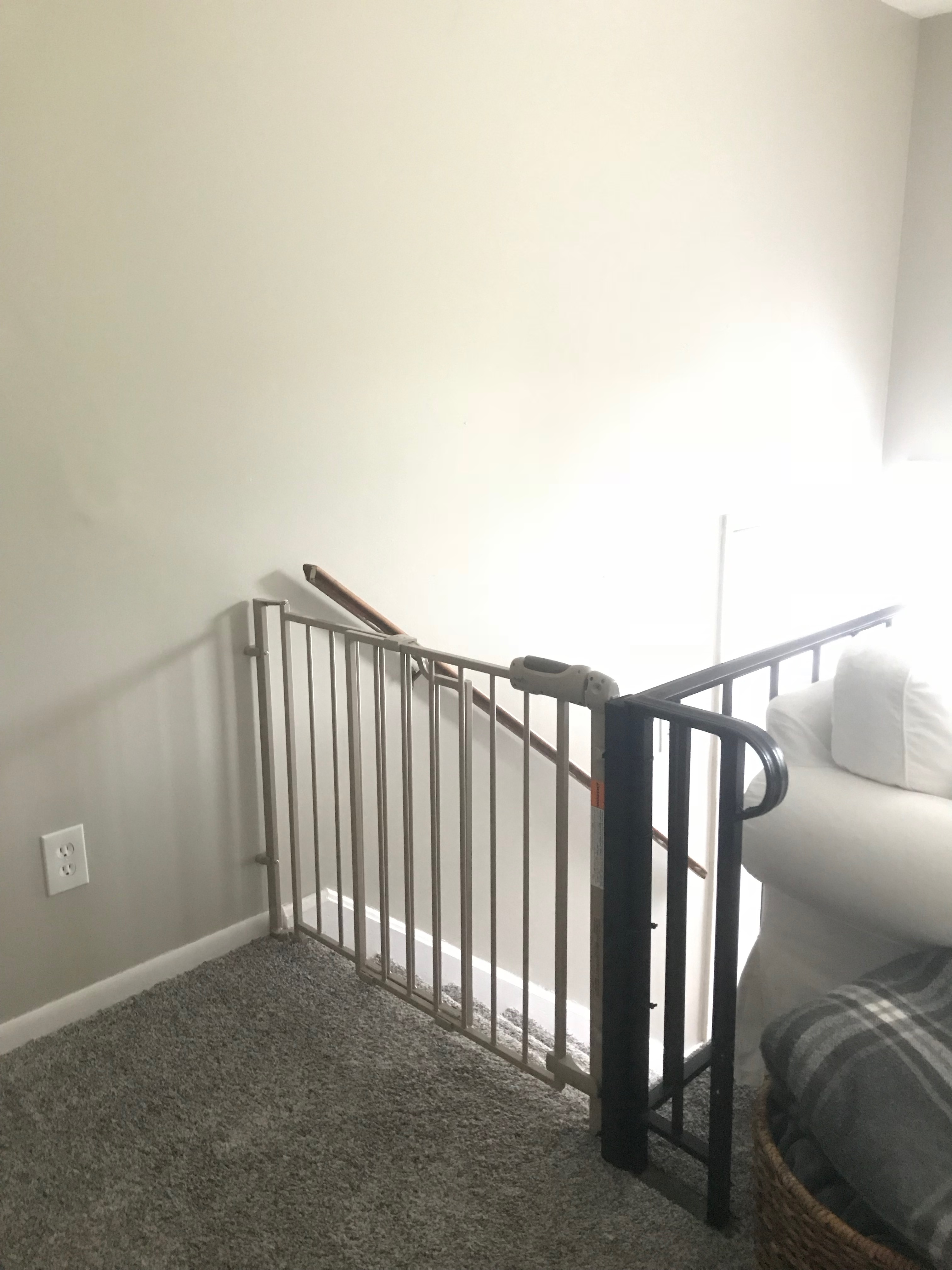 How to install baby gates at the top of the stairs when there’s only one wall. An affordable, easy method for installing baby gates on a railing or spindle.