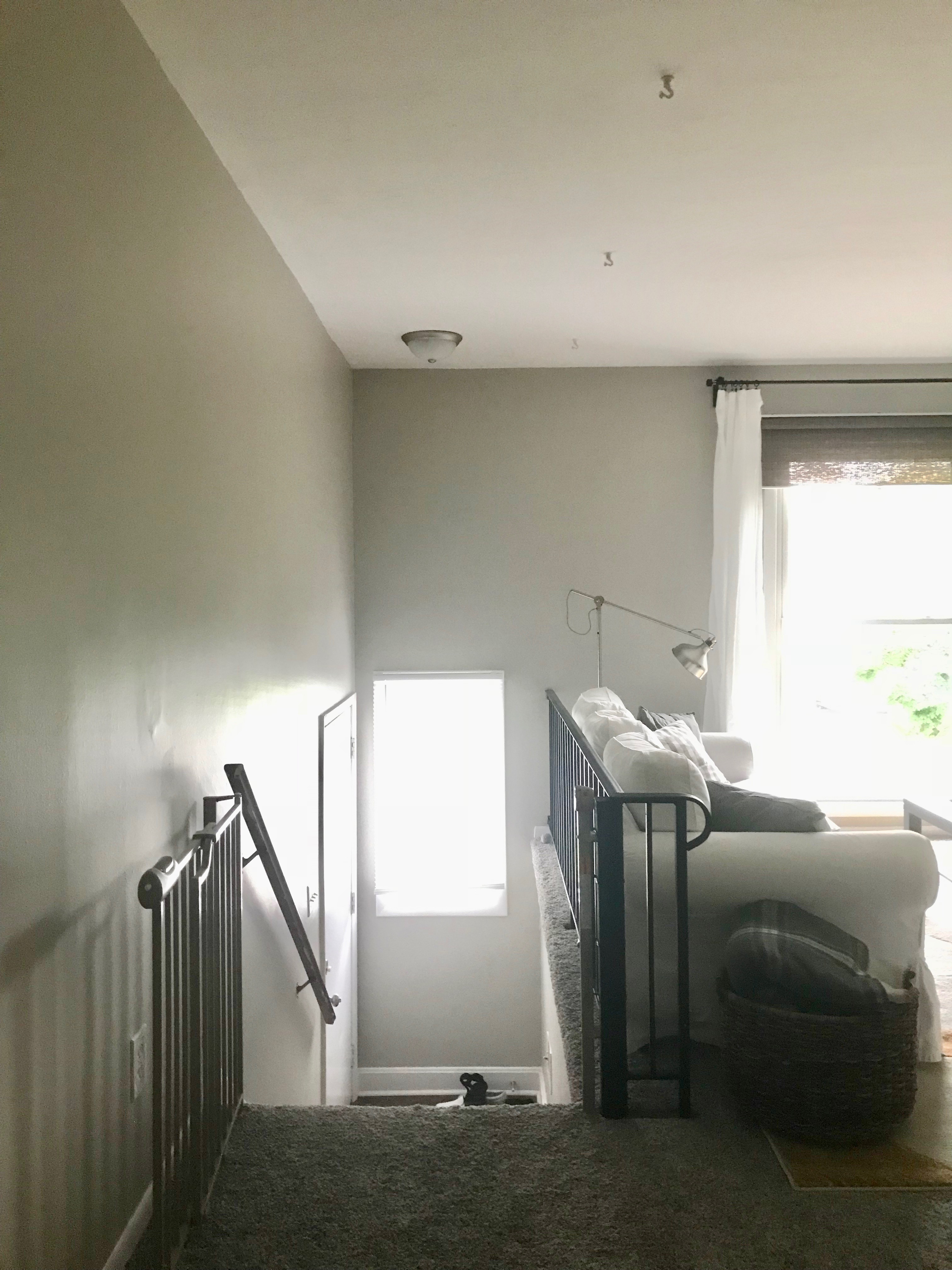 How to install baby gates at the top of the stairs when there’s only one wall. An affordable, easy method for installing baby gates on a railing or spindle.