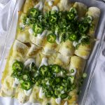 baking pan of creamy chicken enchiladas