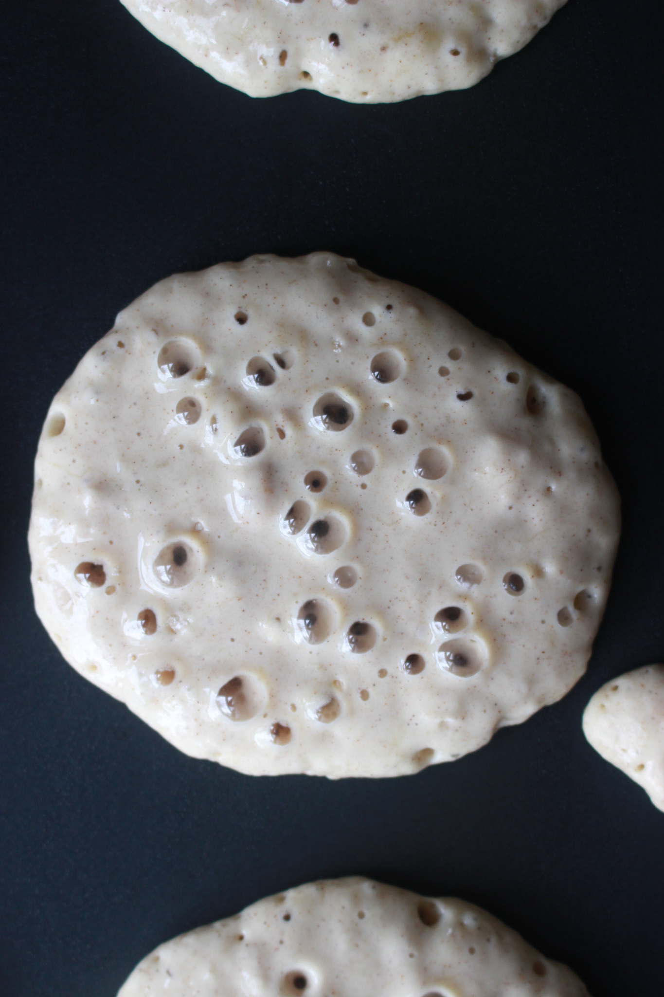 lots of bubbles means pancakes are ready to be flipped