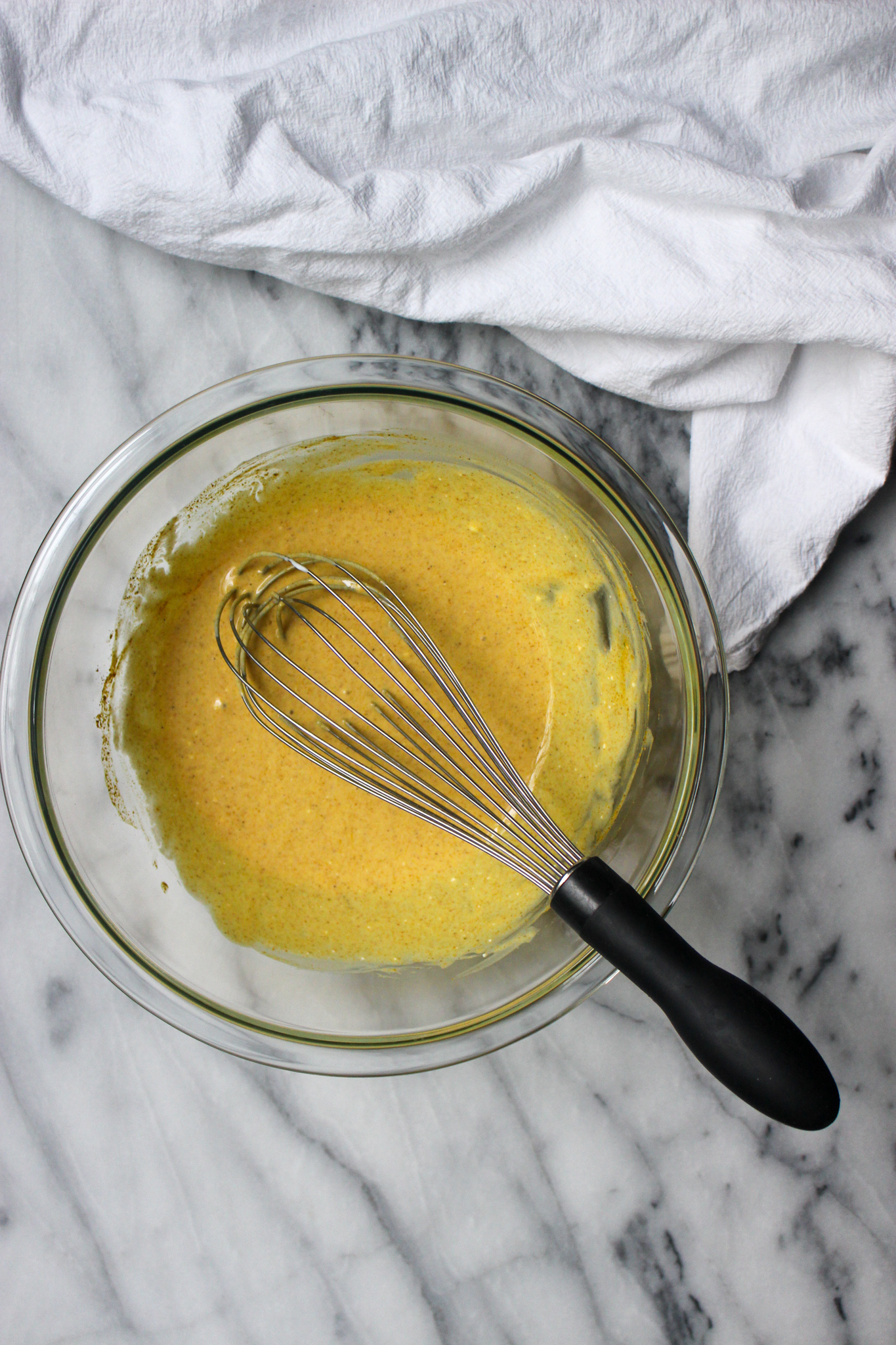 whisking up curry chicken salad dressing