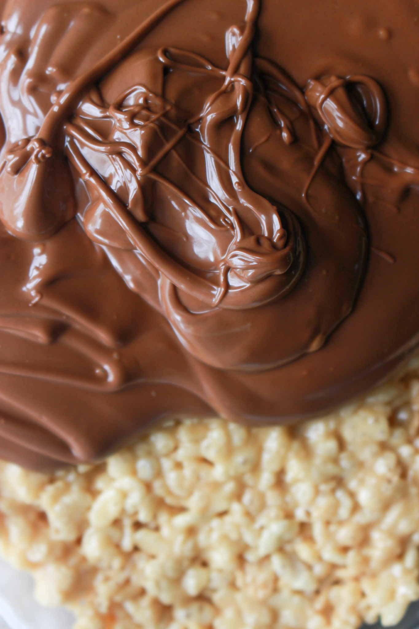 melted butterscotch and chocolate on scotcharoos
