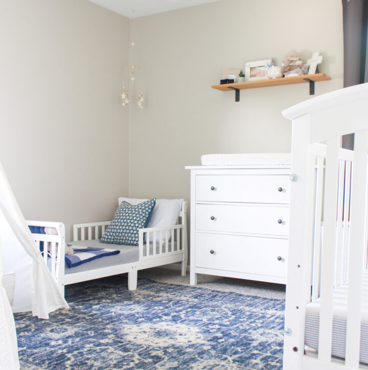 toddler bed and crib in shared bedroom