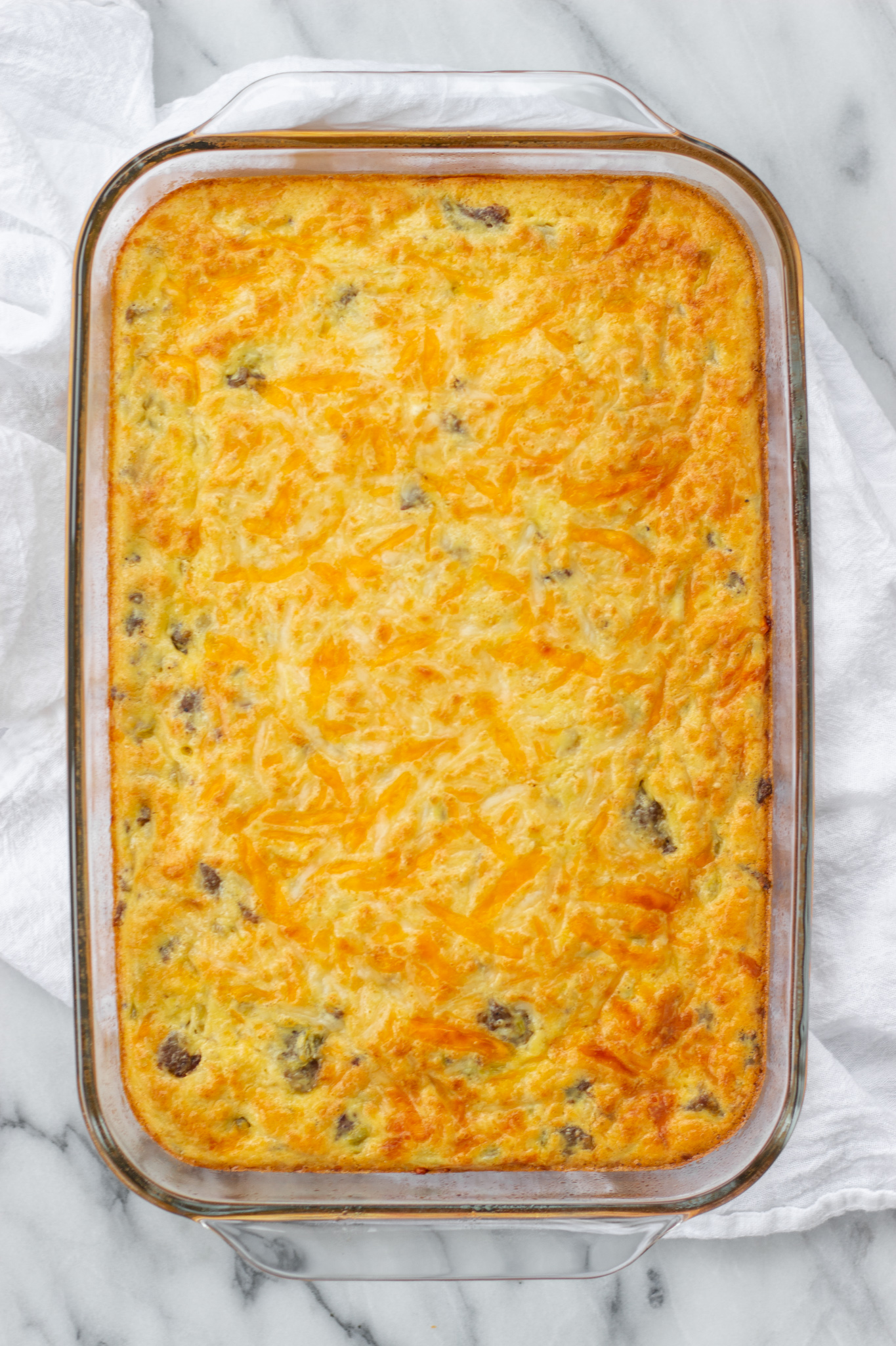 Breakfast casserole in 9 by 13-inch pan.