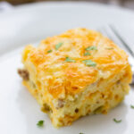 Piece of breakfast casserole on plate.