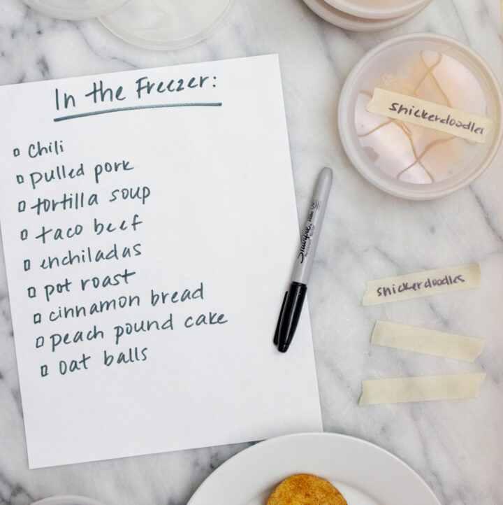 inventory list of freezer meals plus cookies being packaged to freeze